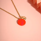 Handgemachte Halskette in Orange mit Anhänger aus Polymer Clay