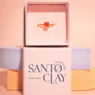 Orangefarbener Ring in Geschenkbox